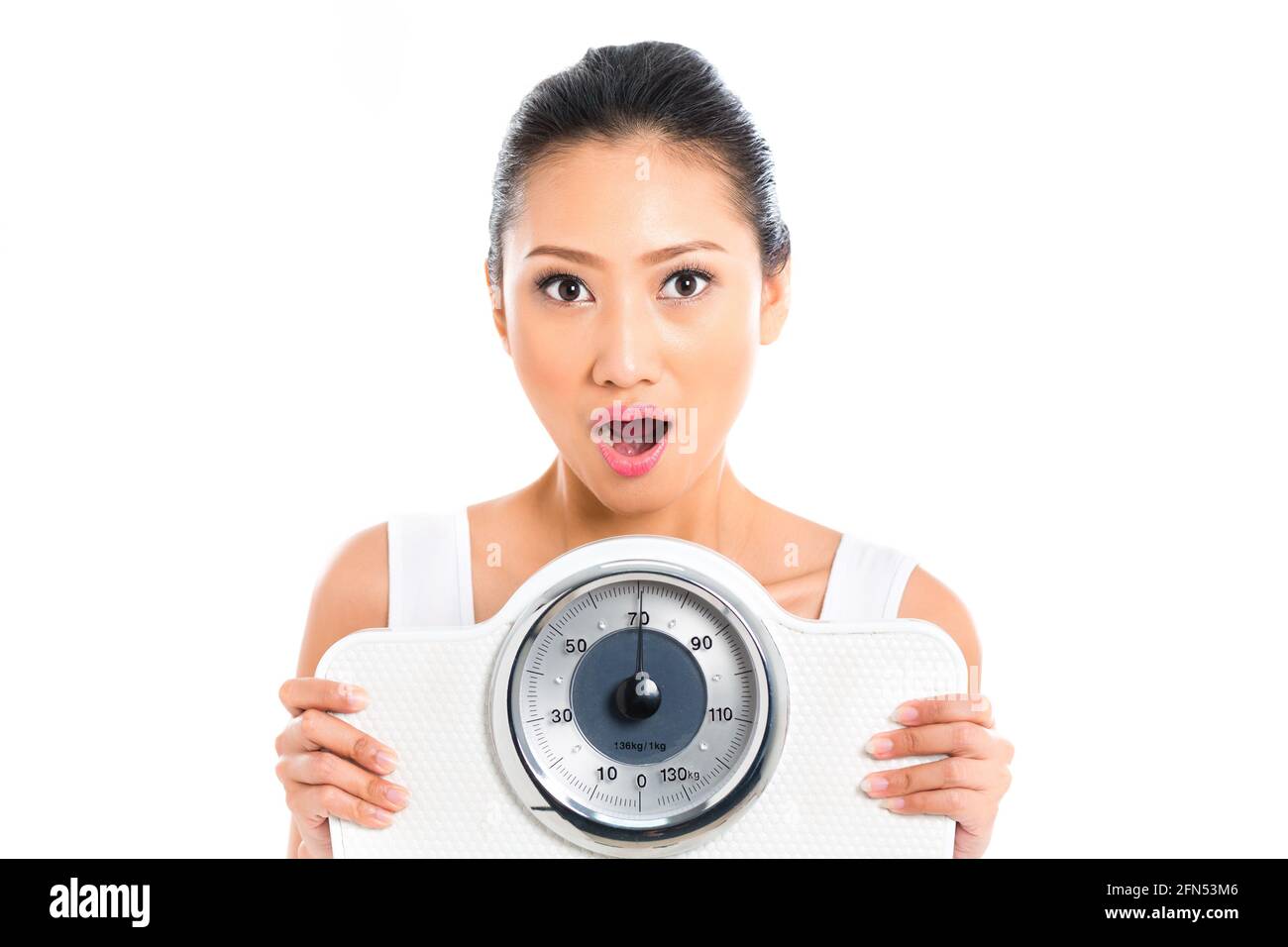 Asian woman with weight scale losing weight Stock Photo Alamy