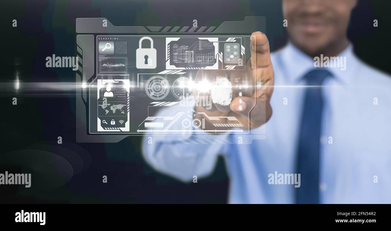 Composition of digital security icons over mixed race man Stock Photo