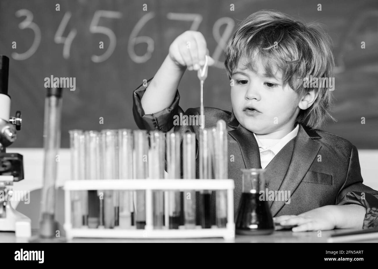 Education concept. Experimenting with chemistry. Talented scientist