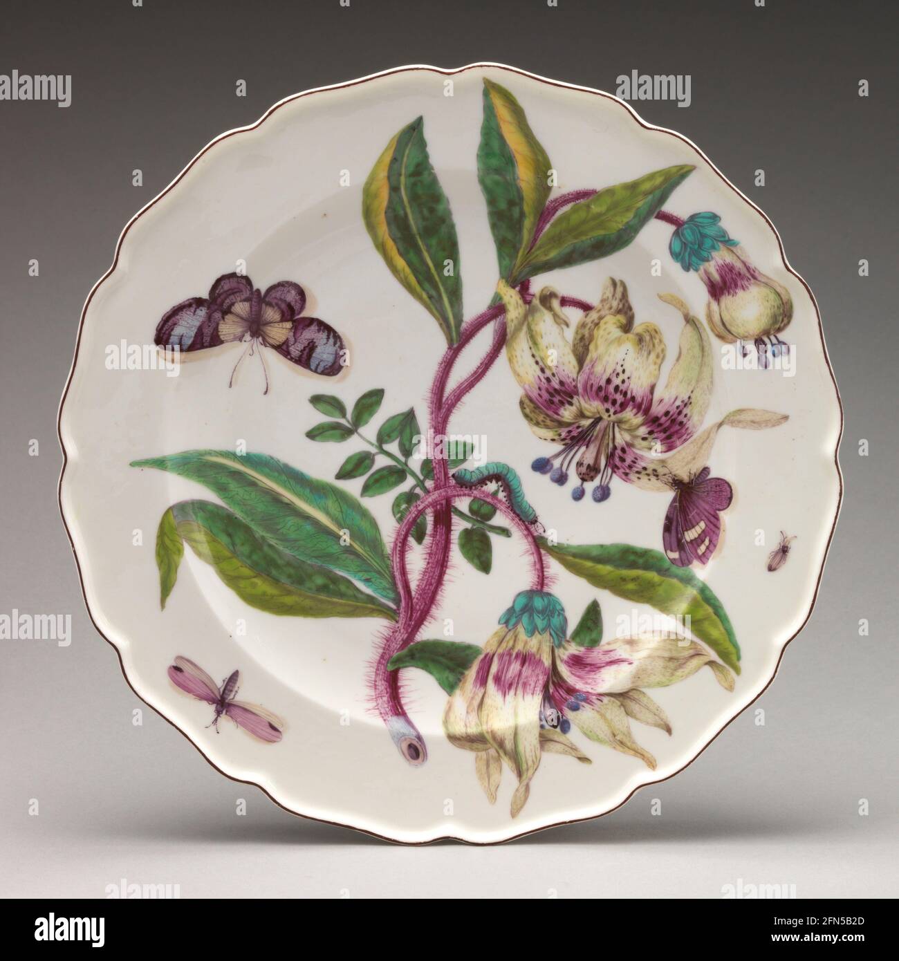 Botanical dish with spray of lilies ca. 1755 Chelsea Porcelain Manufactory Stock Photo