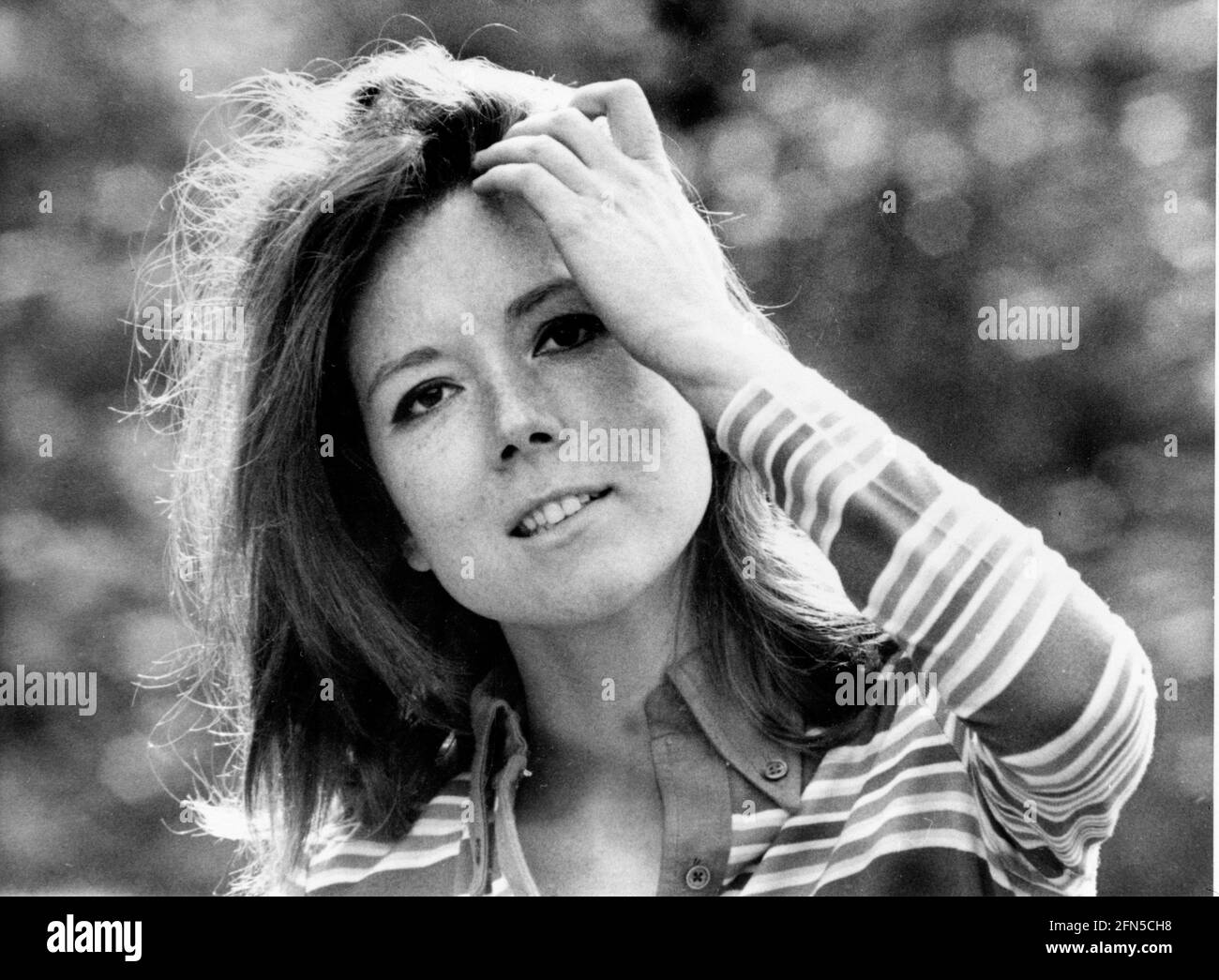 The English star of stage and screen, Diana Rigg, famous for her character Emma Peel in The Avengers, poses for the camera in the 1960s Stock Photo