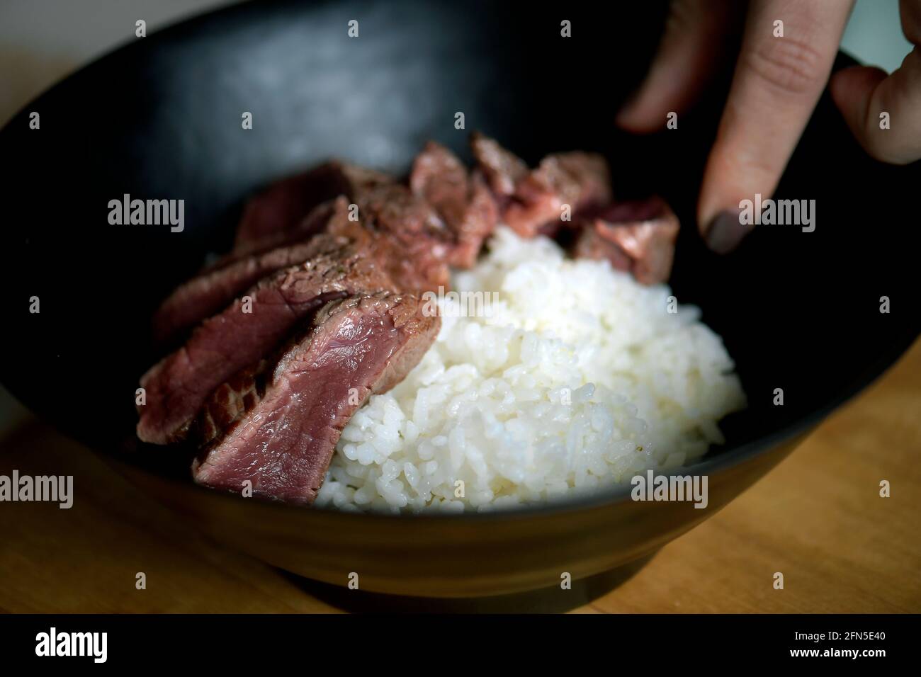 Beef tataki. Fried sirloin steak with delicious sauce of soy and sake