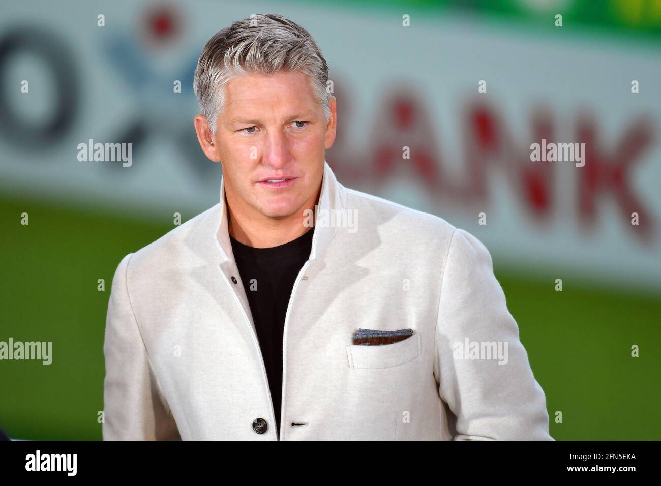 Berlin, Deutschland. 13th May, 2021. ARD football expert Bastian SCHWEINSTEIGER, single image, trimmed single motif, portrait, portrait, portrait. 78th DFB Pokal Final, RB Leipzig (L) - Borussia Dortmund (DO) 1-4 in the Olympic Stadium in Berlin/Germany on May 13th, 2021. ## DFL/DFB regulations prohibit any use of photographs as image sequences and/or quasi-video ## | usage worldwide Credit: dpa/Alamy Live News Stock Photo
