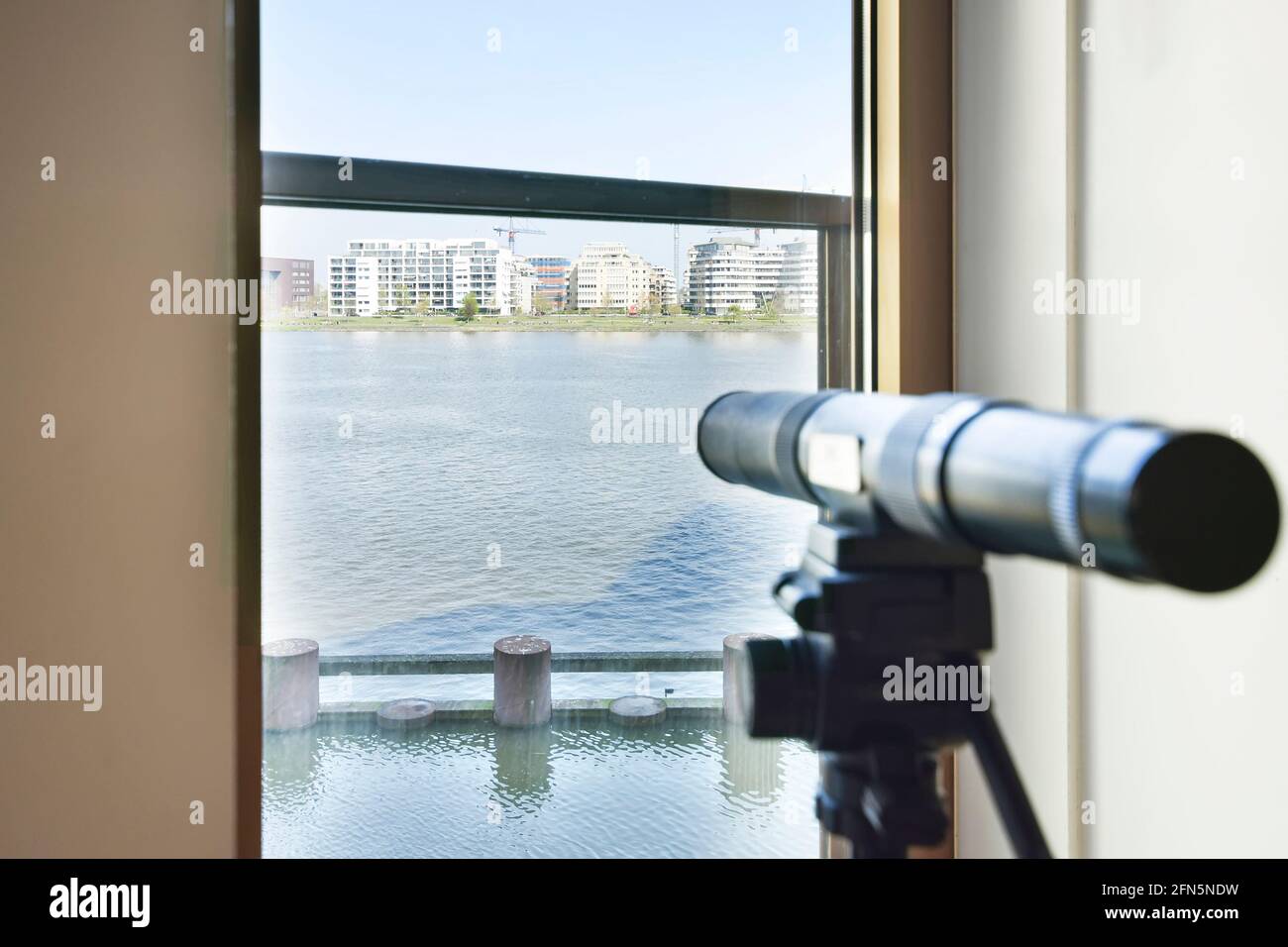 Living room with telescope Stock Photo Alamy