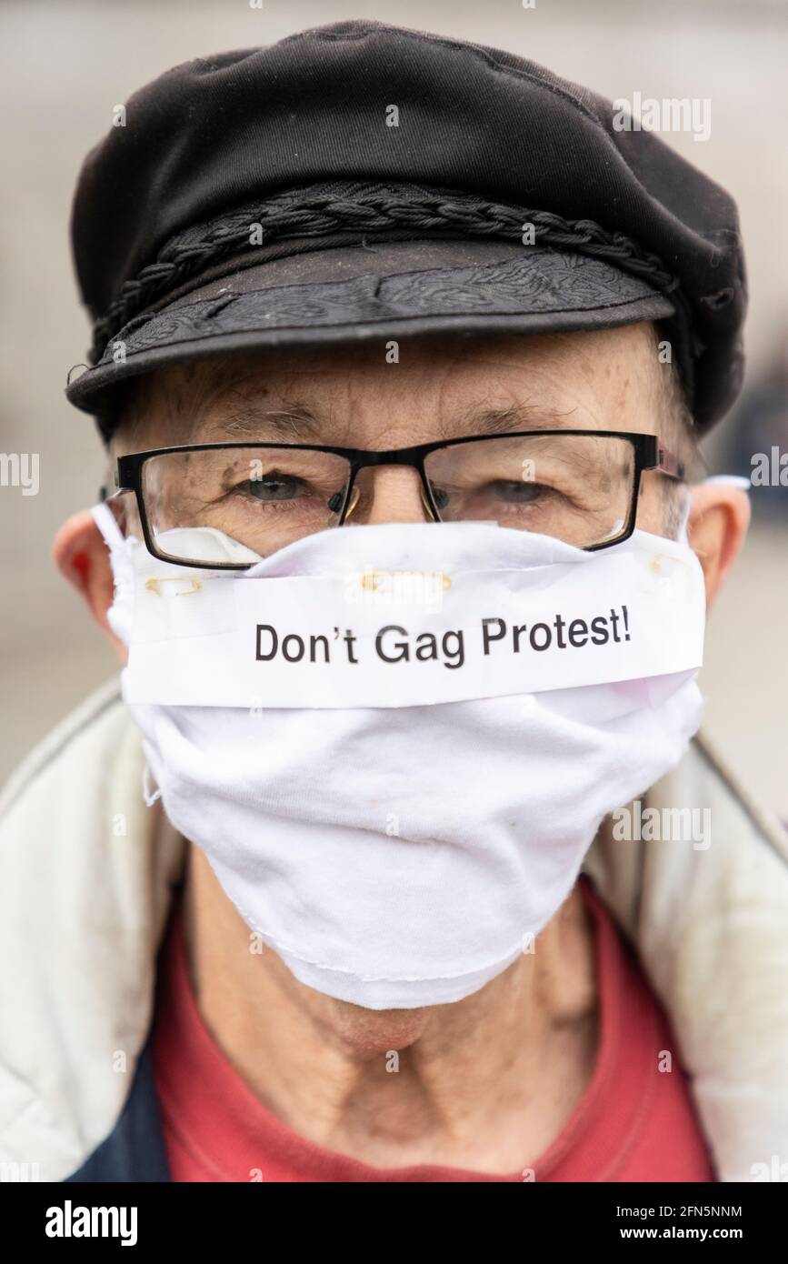 Headshot of an elderly protester in face mask at 'Kill the Bill' protest against new policing bill, London, 1 May 2021 Stock Photo