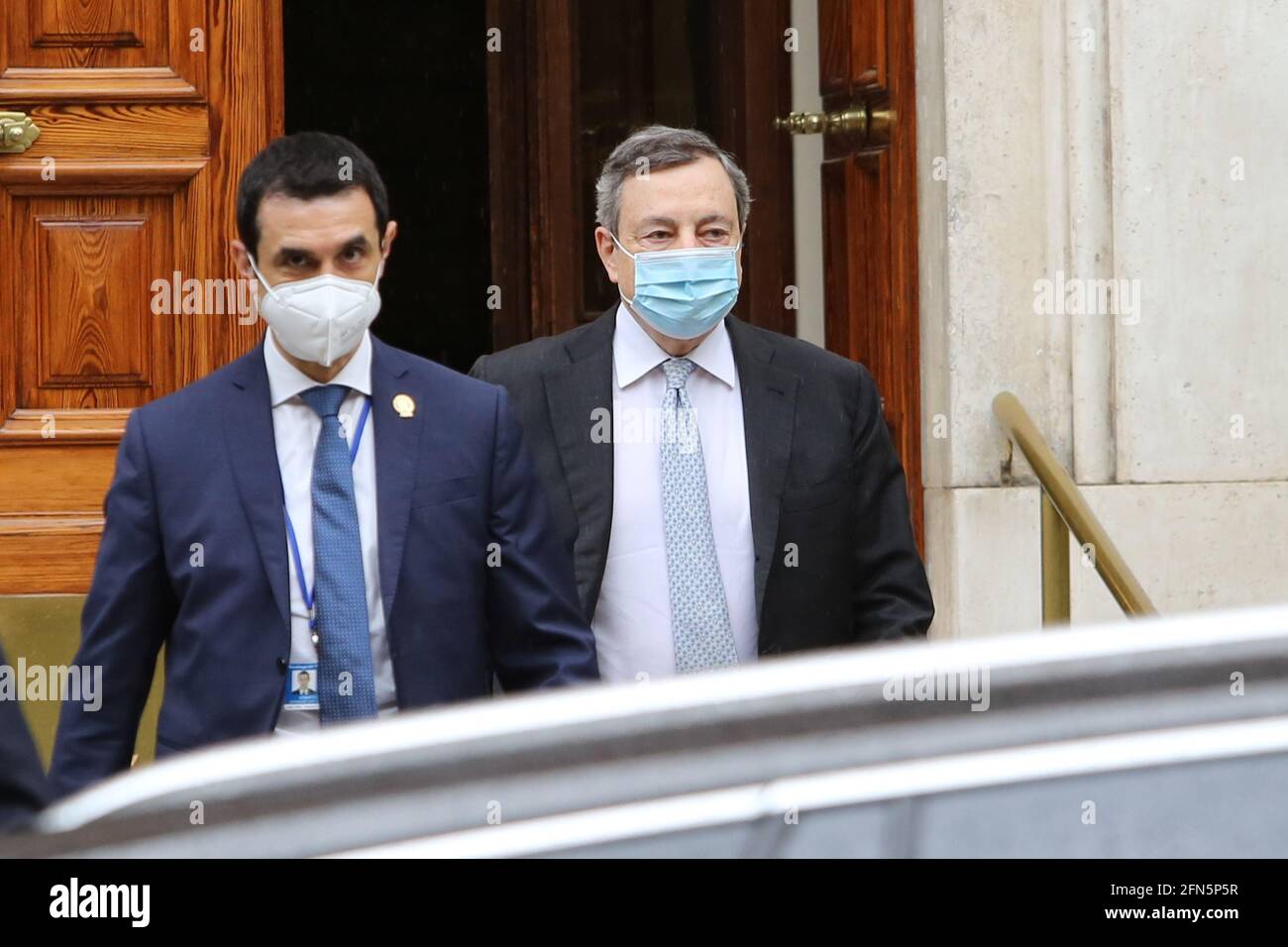 Rome, Italy. 14th May, 2021. ROME, Italy - 14.5.2021: Mario Draghi, the premier of the Italian government, leaves home, accompanied by the escort, to go to Palazzo Chigi, greets the photographers. Credit: Independent Photo Agency/Alamy Live News Stock Photo