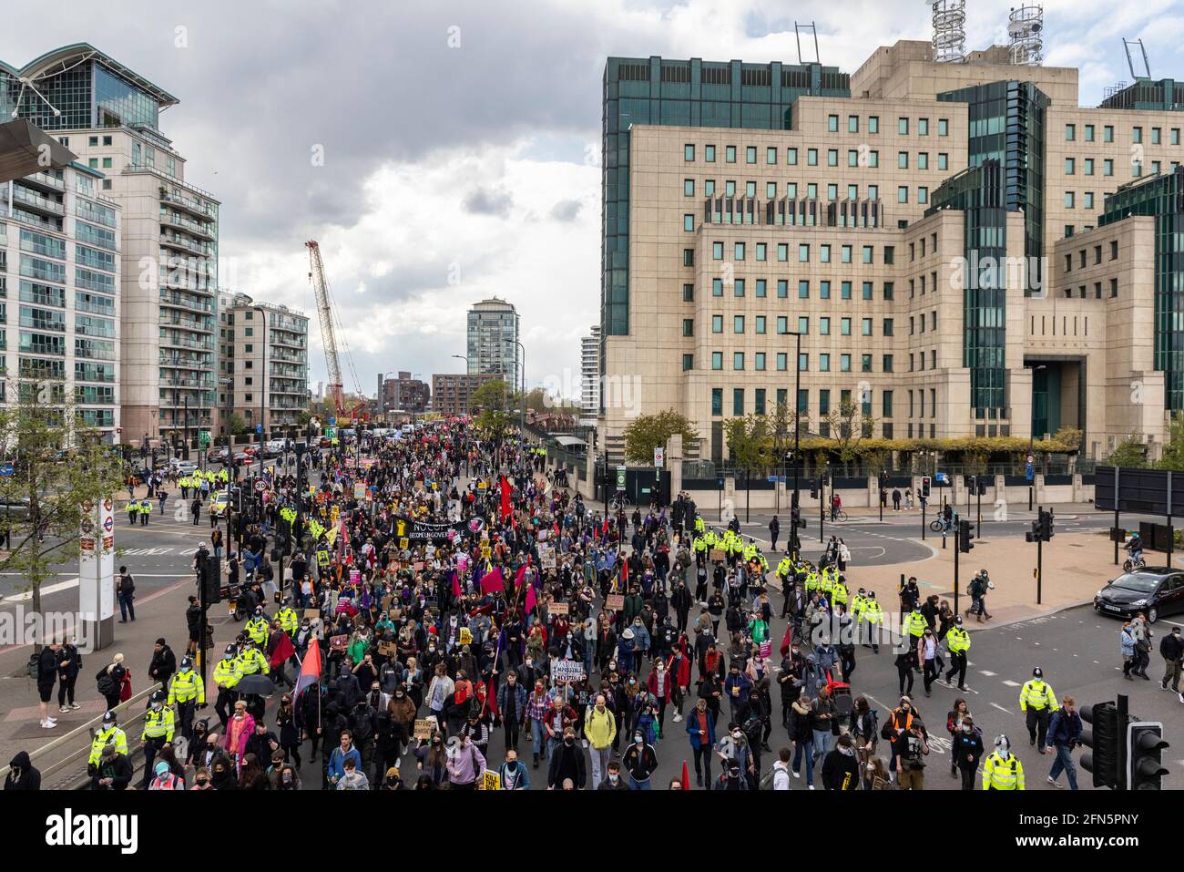 Crowd of protesters march past the MI5 building during a 'Kill the Bill' protest against new policing bill, London, 1 May 2021 Stock Photo