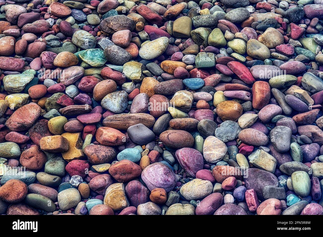 Colorful rocks on shore of Lake McDonald, Glacier National Park, Montana  Stock Photo - Alamy