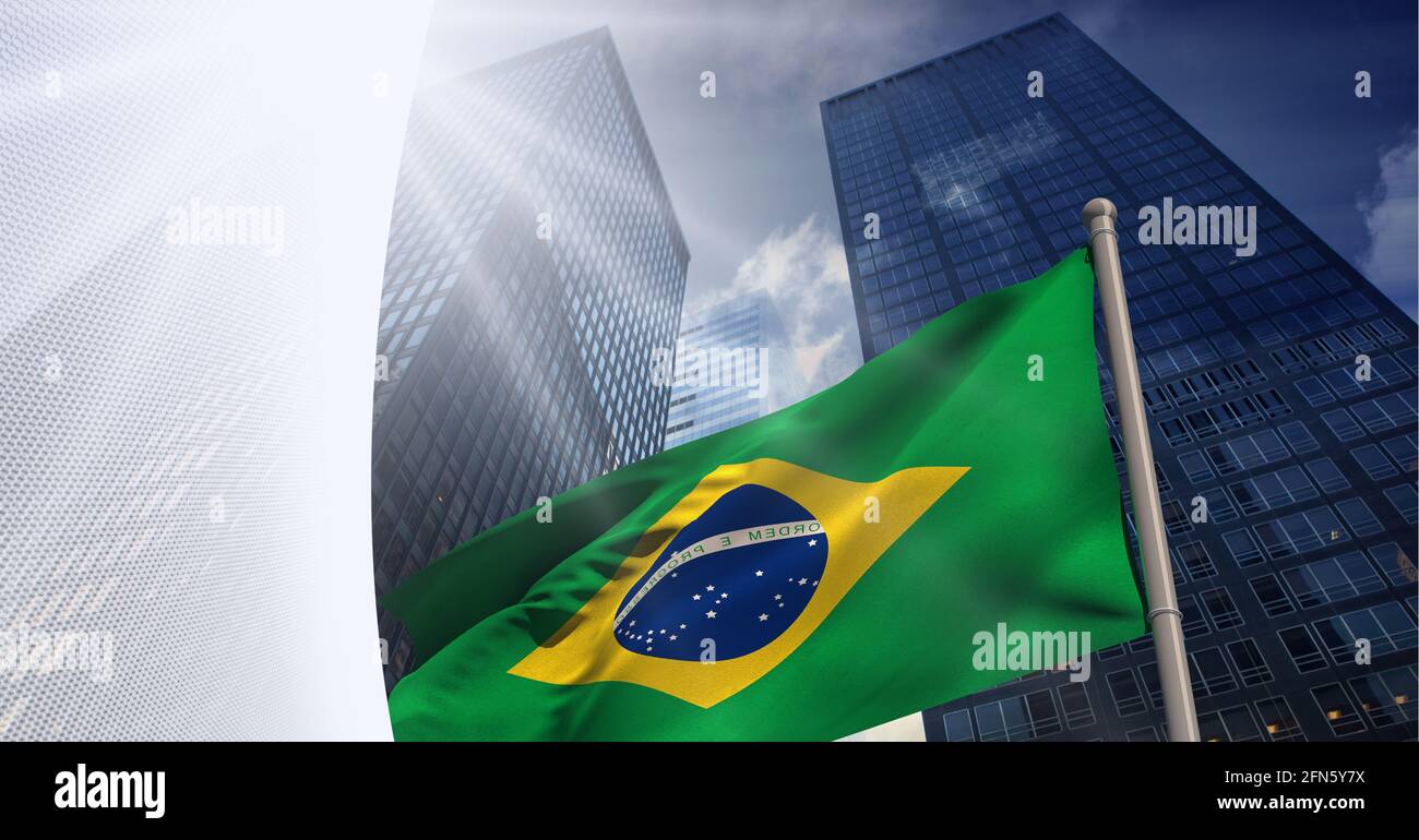 Abstract grey geometrical shapes over brazil flag against tall buildings in background Stock Photo