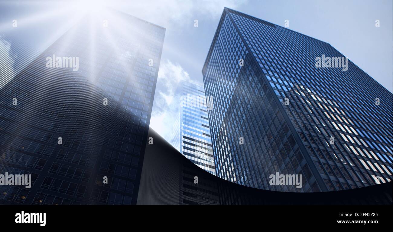 Digital composite image of abstract black geometrical shapes against tall buildings in background Stock Photo
