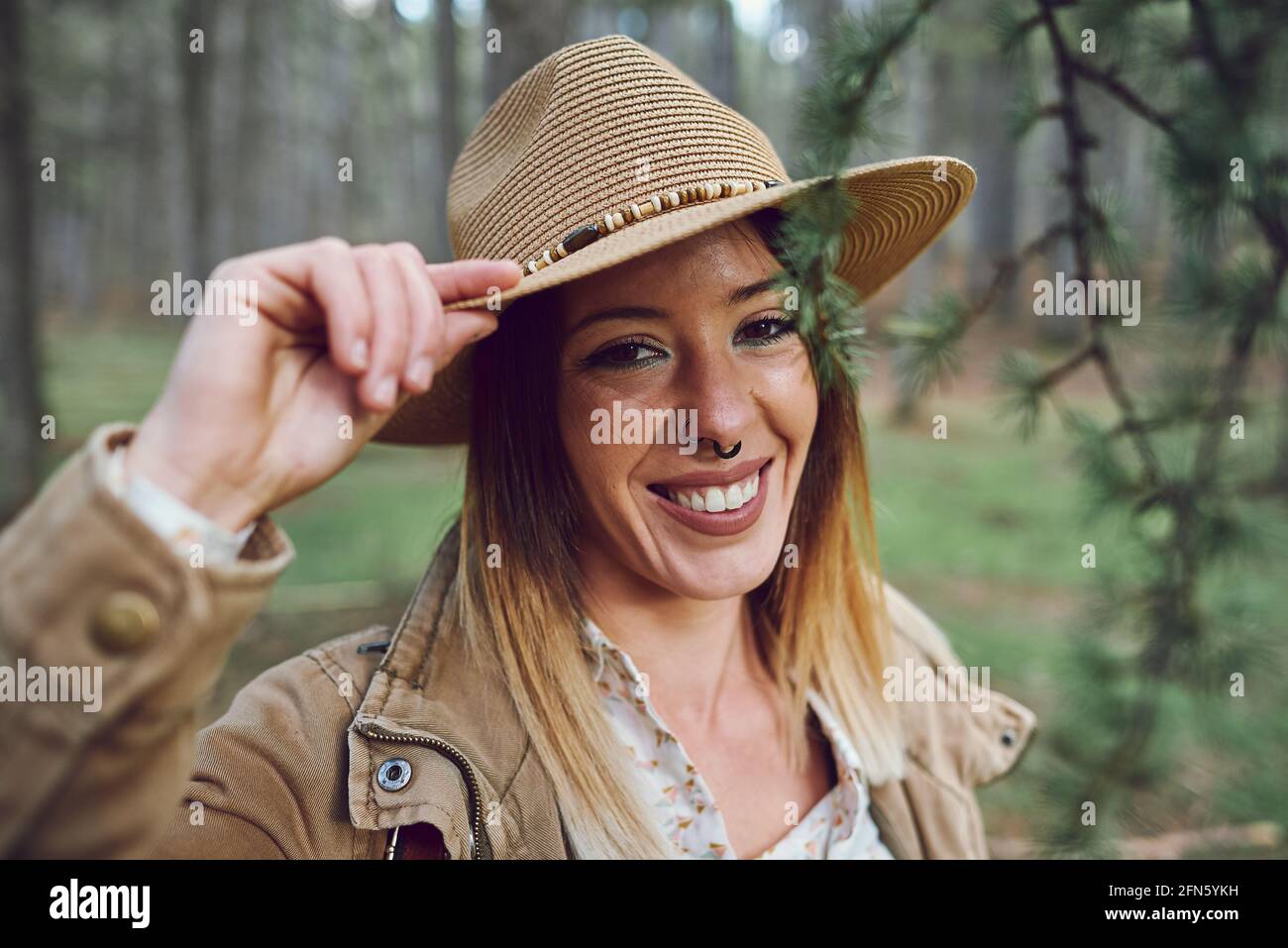 woman-on-the-mountain-she-is-in-a-forest-with-pine-trees-stock-photo-alamy