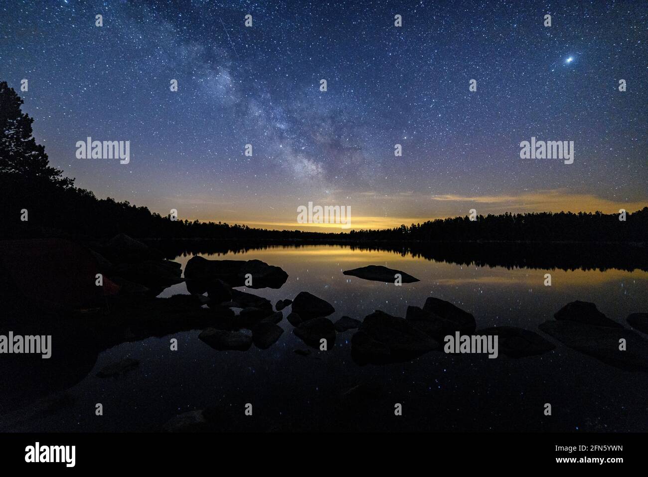 Malniu Lake, a summer night with Milky Way (Cerdanya, Catalonia, Spain, Pyrenees) ESP: Lago de Malniu, una noche de verano con la Vía Láctea Stock Photo