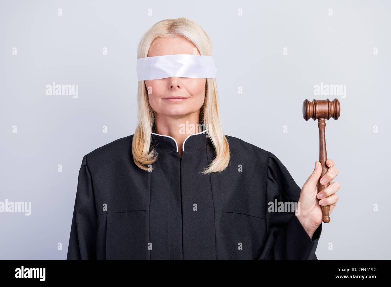 Photo of old woman hold gavel hammer judge blind justice professional  isolated on grey color background Stock Photo - Alamy