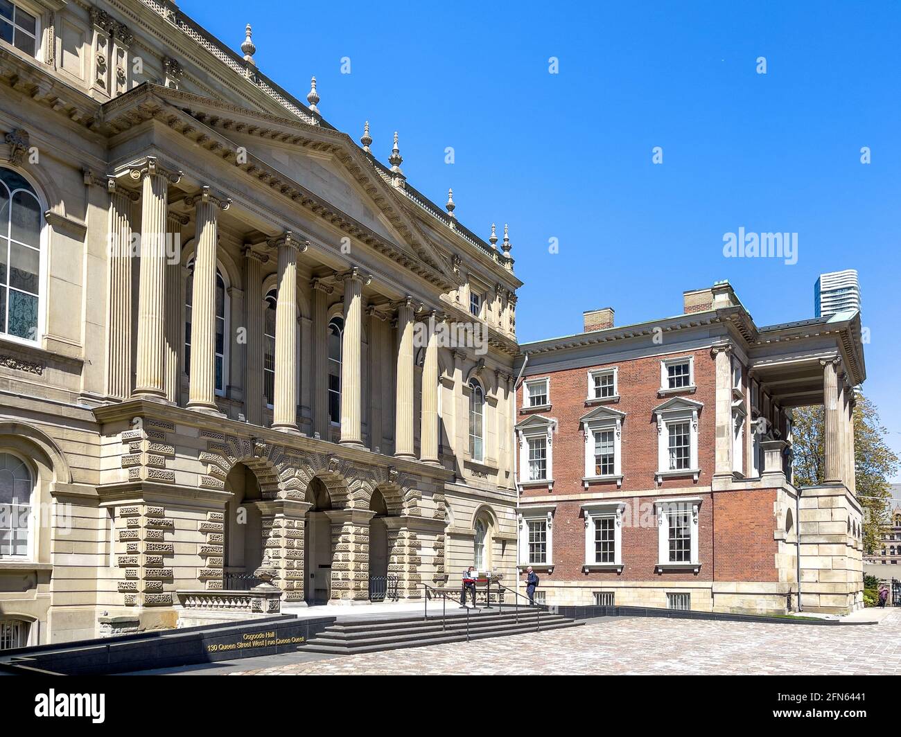 Osgoode Hall with a  late Palladian architectural style. The landmark is placed in the downtown district by the Nathan Phillips square in Toronto, Can Stock Photo