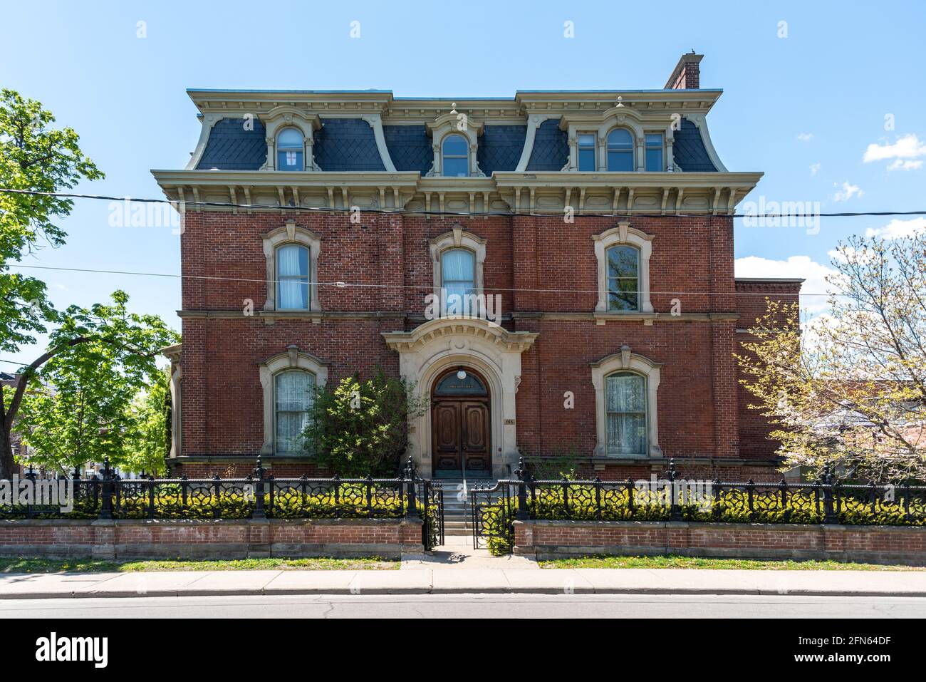 The George Brown heritage house in Toronto, Canada. Architectural details of the Second Empire-style building. Stock Photo