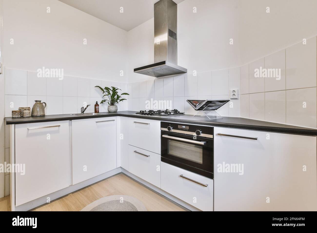 Interior of modern light kitchen Stock Photo - Alamy