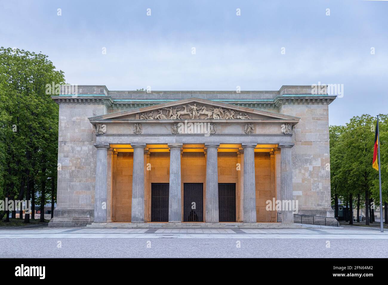 'Neue Wache' guard post is a historical Neo-Classical building on Unter Den Linden main boulevard in Berlin. Stock Photo