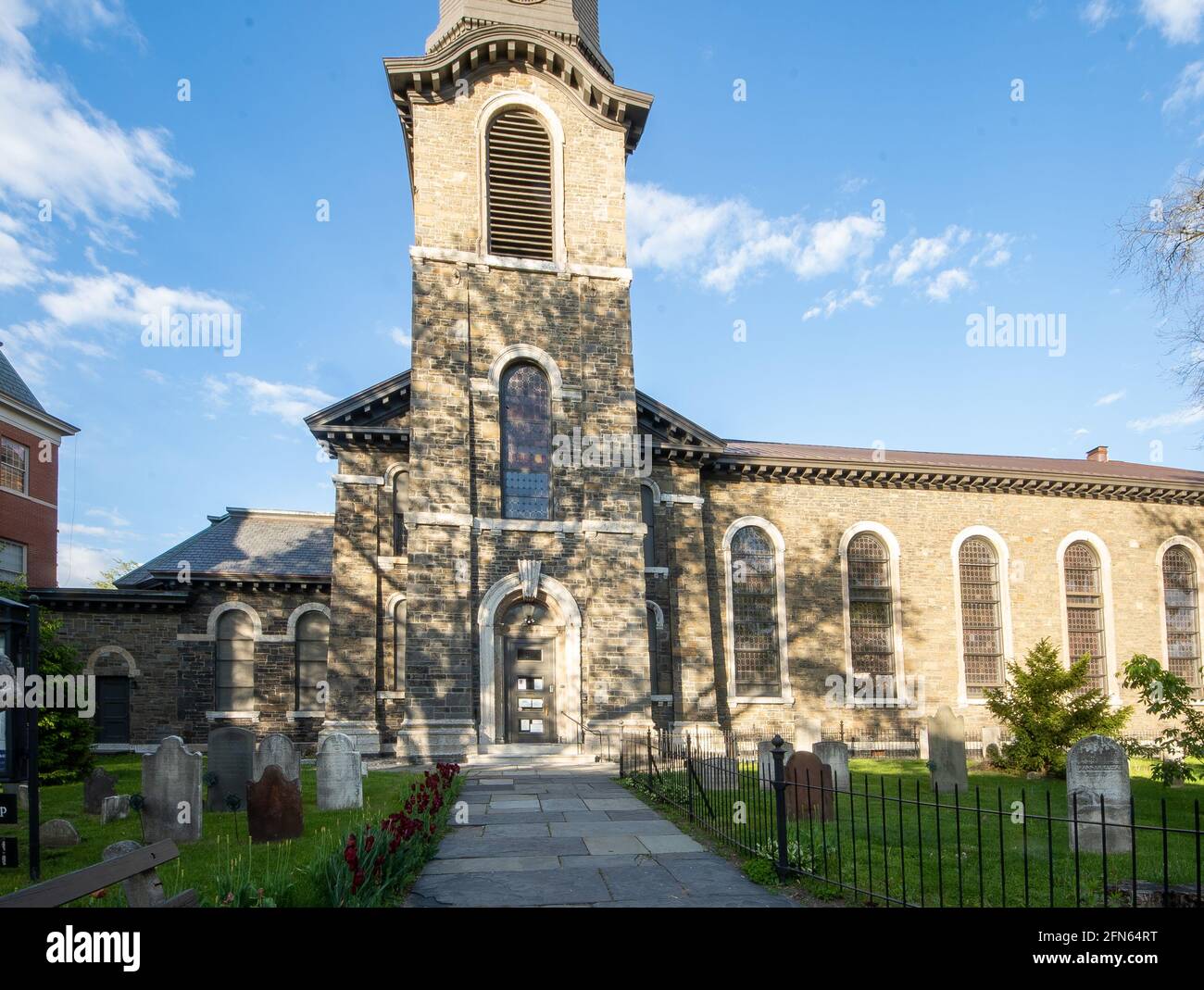 Kingston, NY - USA- May 12, 2021: The Old Dutch Church, a 19th-century bluestone church and cemetery located on Wall Street in the Kingston Stockade D Stock Photo