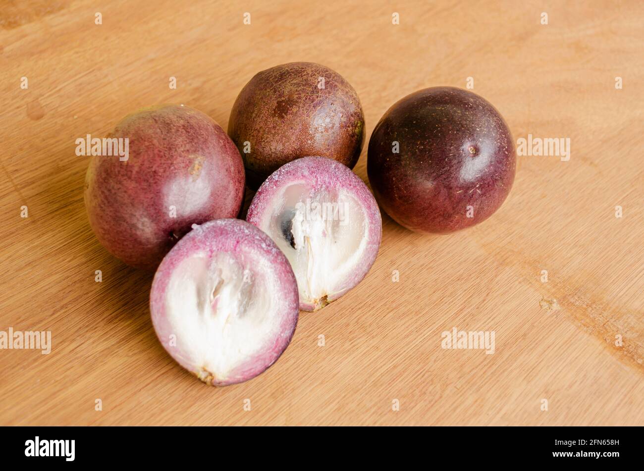 White Flesh Of Purple Star Apples Stock Photo