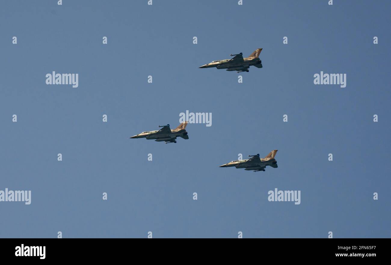Tel Aviv, Israel - April 15th, 2021: Three F-16 israeli fighter planes on the israeli air force airshow on Israel's 73rd independence day. Stock Photo