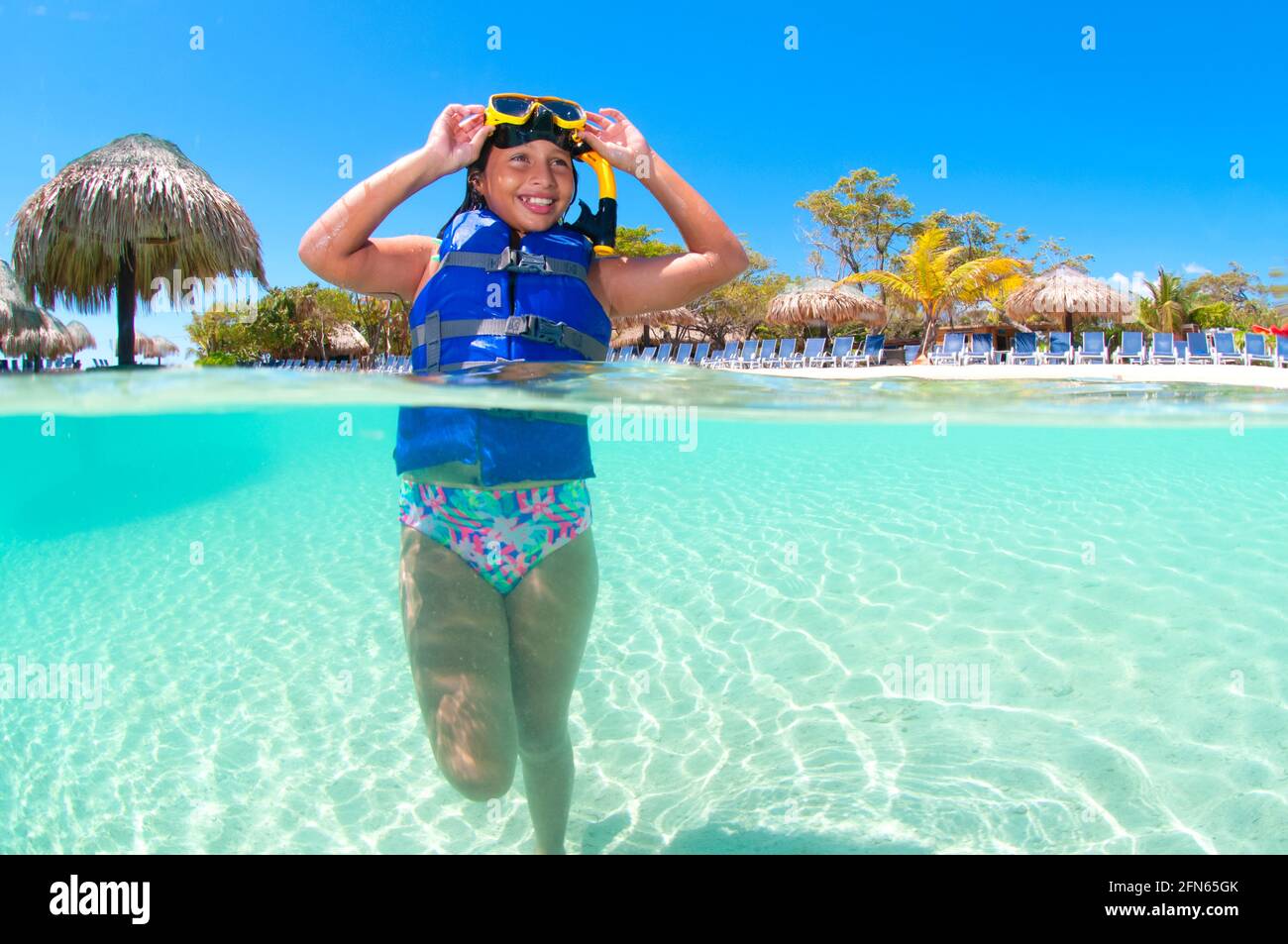 Young girl snorkelling the Caribbean Sea Stock Photo