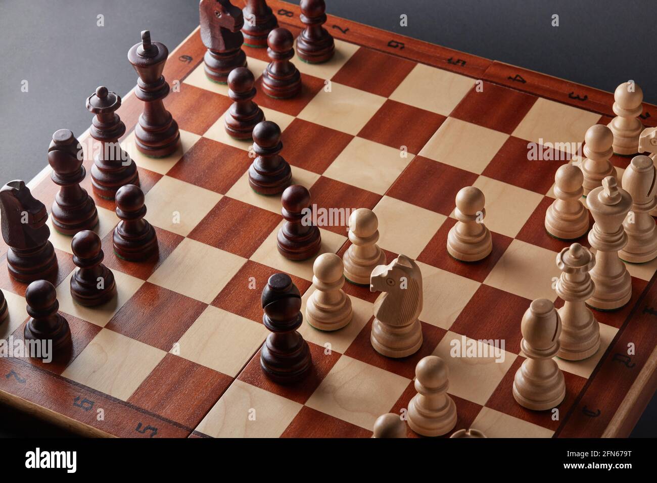 Browse Free HD Images of Chess Pieces Set Up On A Wooden Chess Board