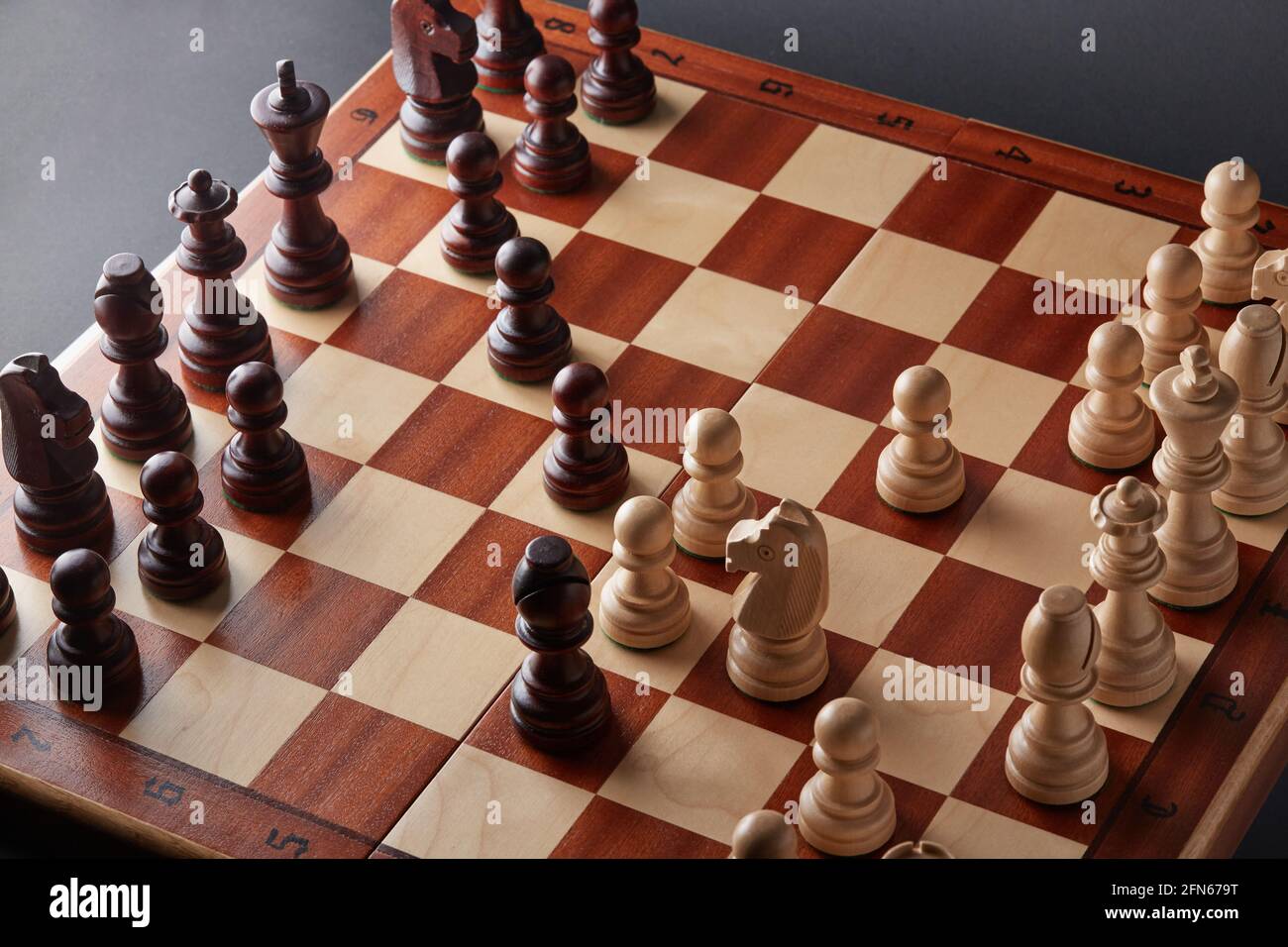 Classic Wooden Tournament chess set on black background