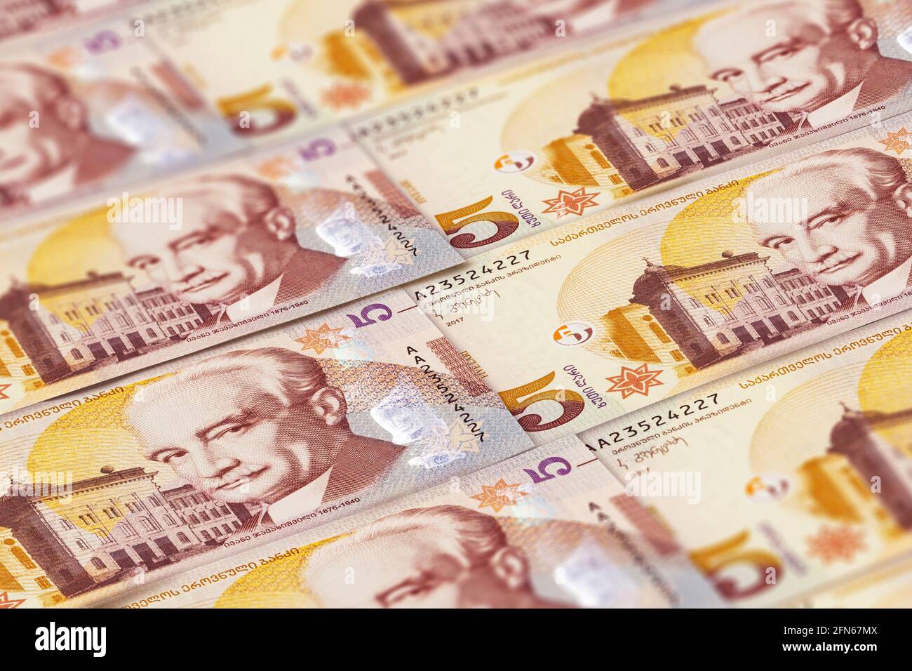 Georgian lari banknotes. 5 Georgian lari. Finance, business background. Perfect for news, reportage Stock Photo