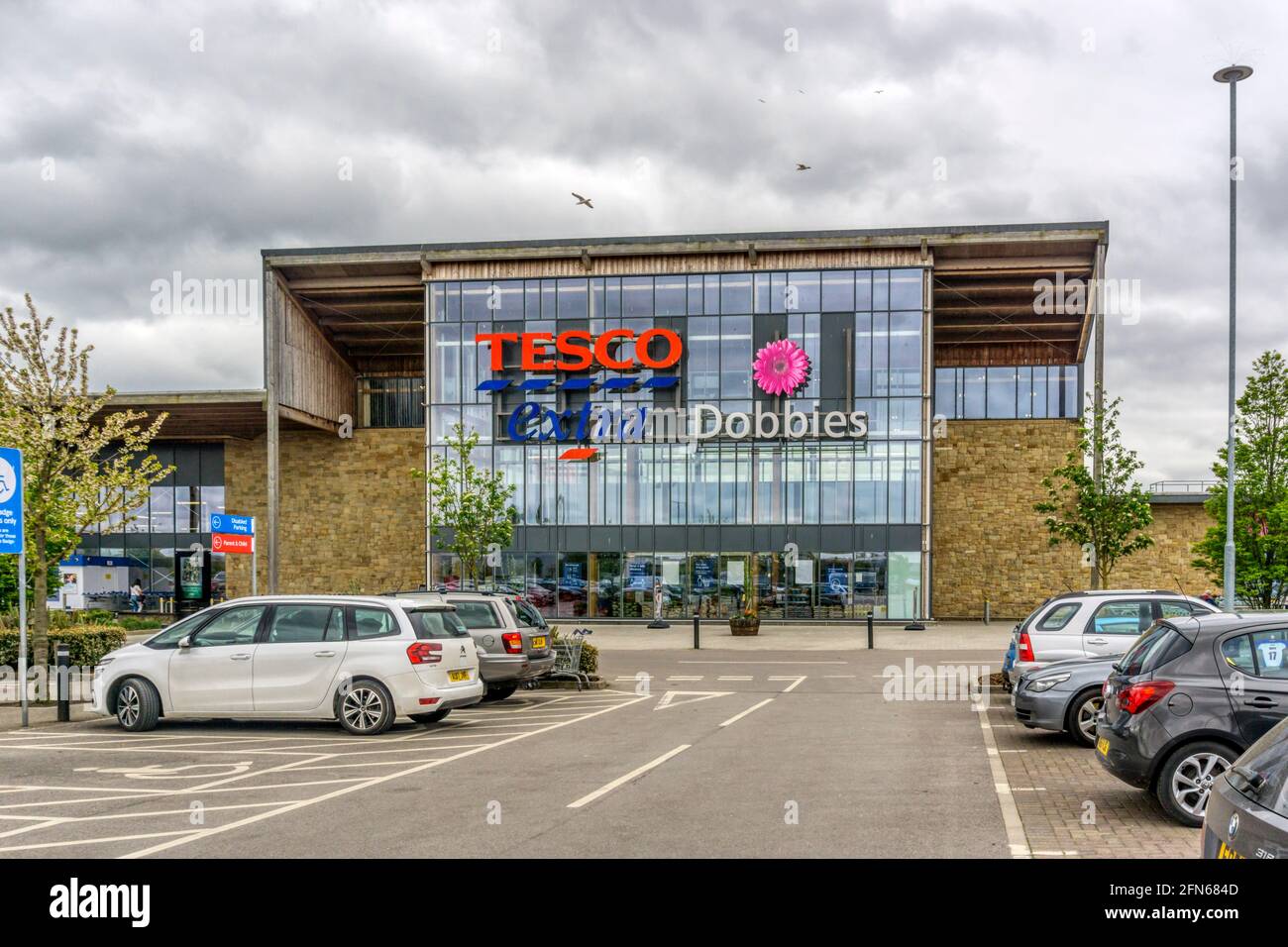 A Tesco Extra superstore with a Dobbies garden centre. Stock Photo