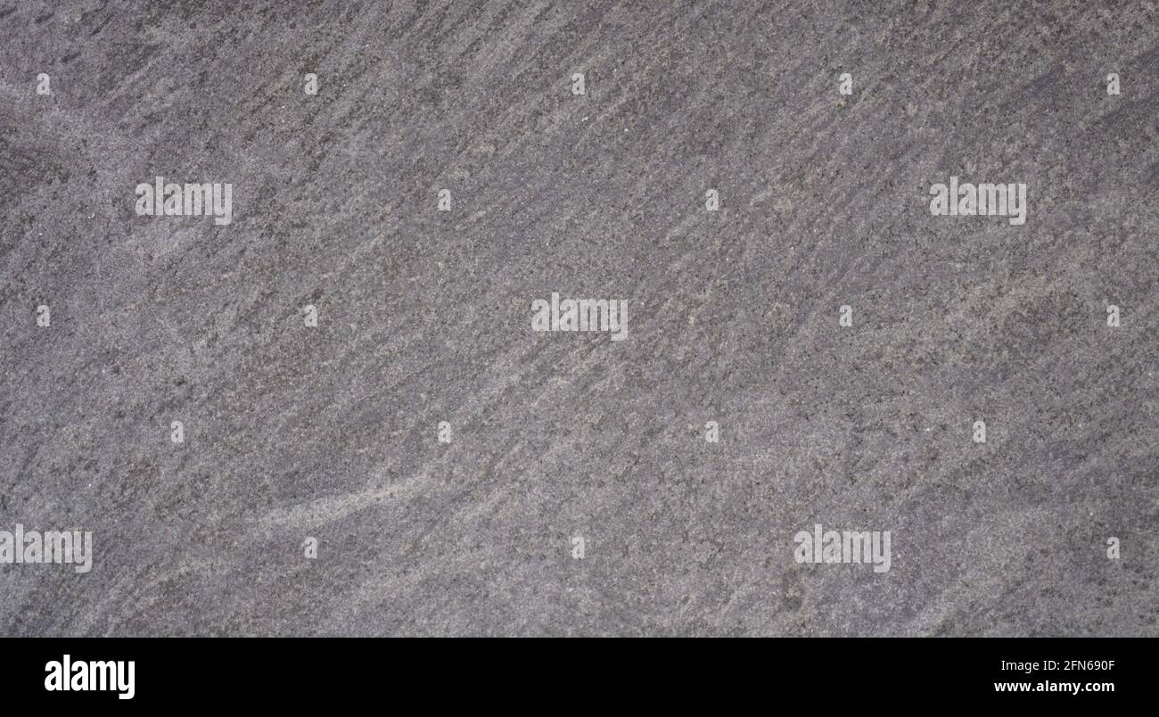 Marbled pattern of a smooth gray stone slab, natural stone cut and ...