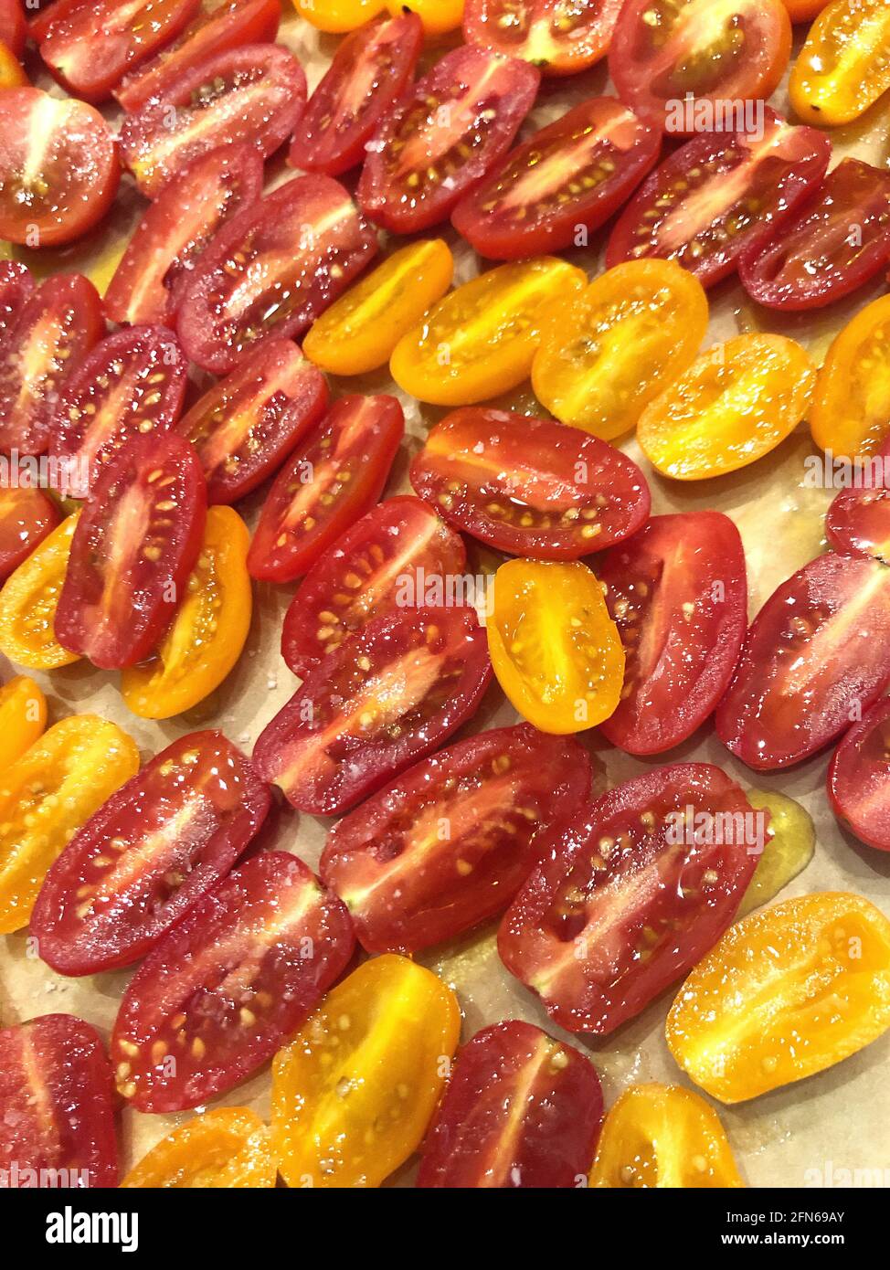 Sliced Red and Yellow Baby Tomatoes Stock Photo