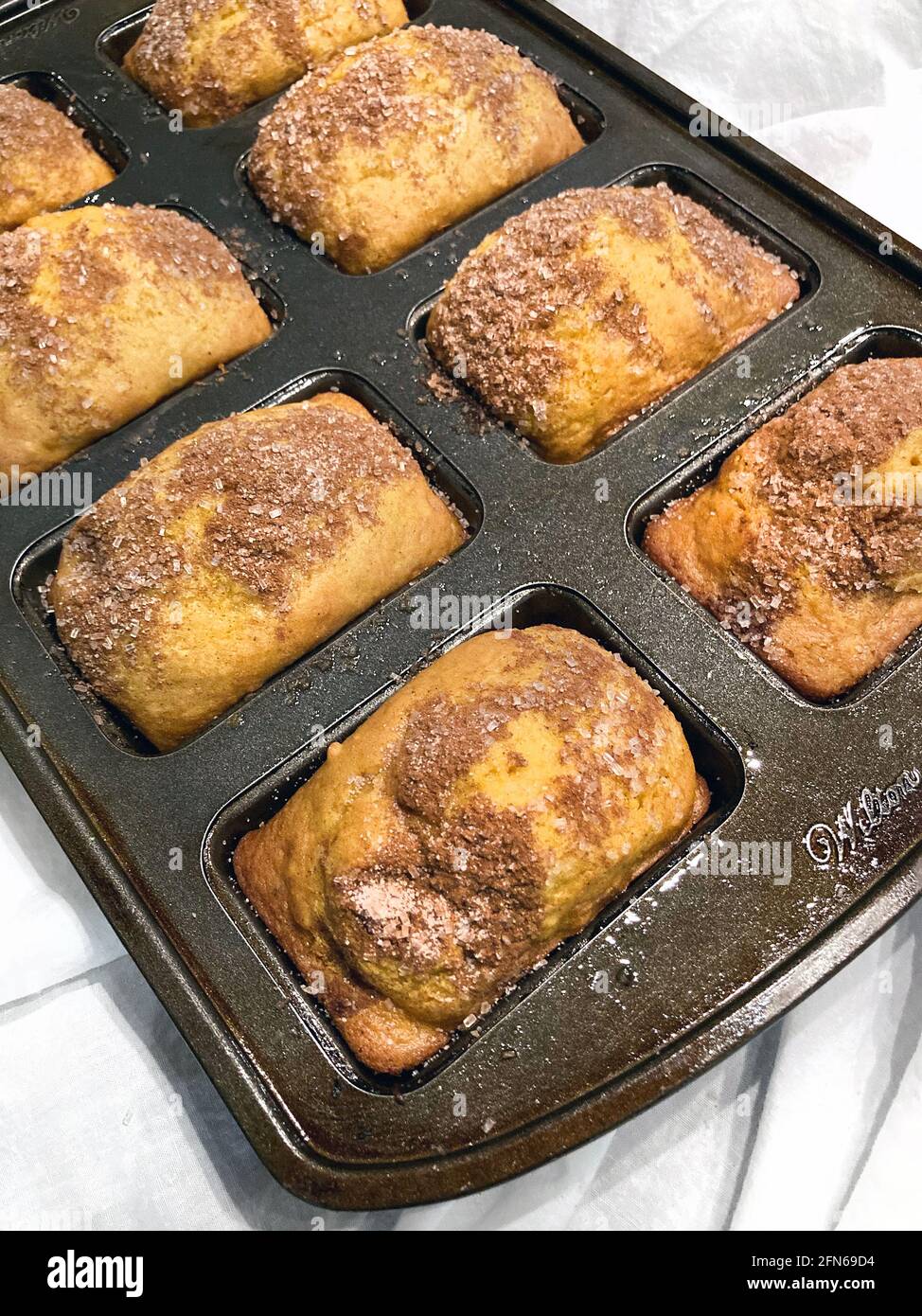 Mini Pumpkin Breads in Baking Tin Stock Photo