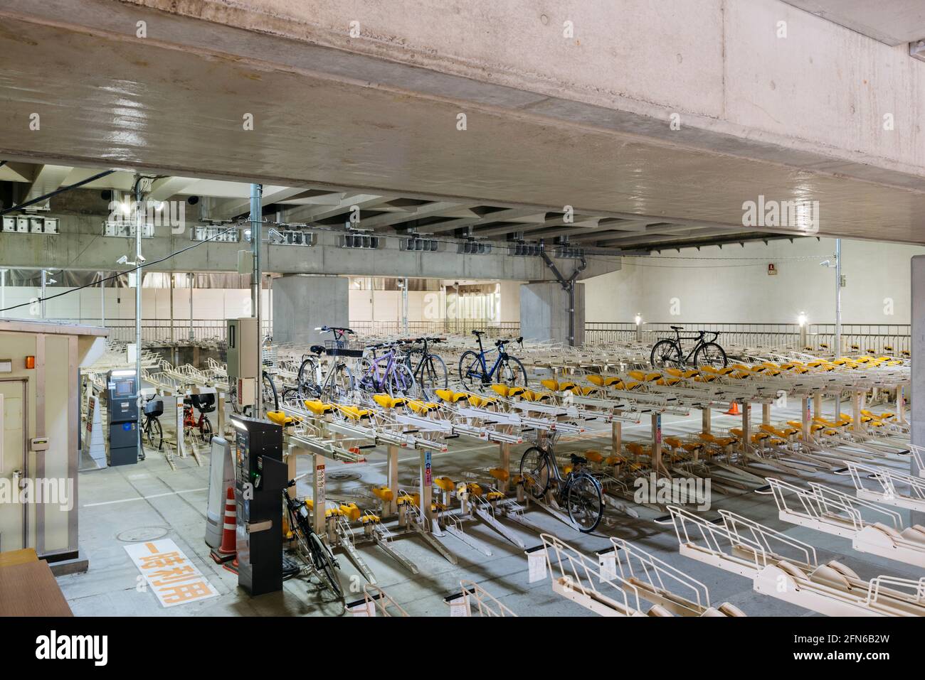 Tokyo, Japan - January 10, 2016: Multi level bicycles parking indoor garage near the Asakusa, Tokyo, Japan. Stock Photo