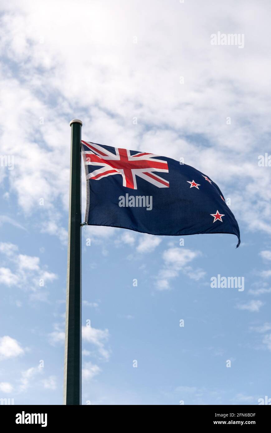 New Zealand flag in the wind. Stock Photo