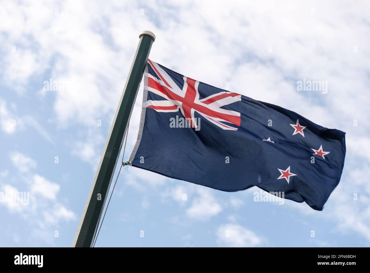 New Zealand flag in the wind. Stock Photo