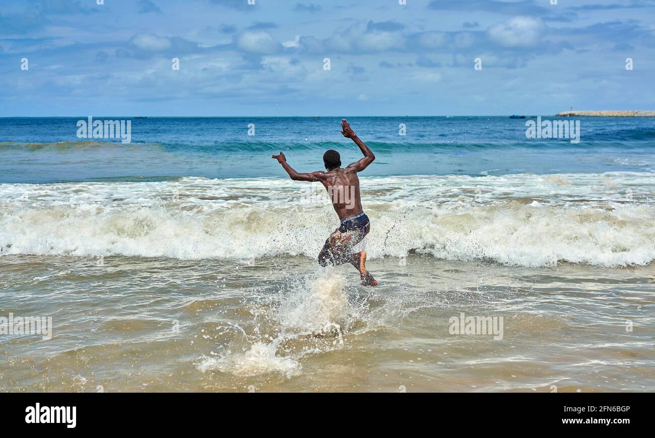 african teens play on the beach Stock Photo