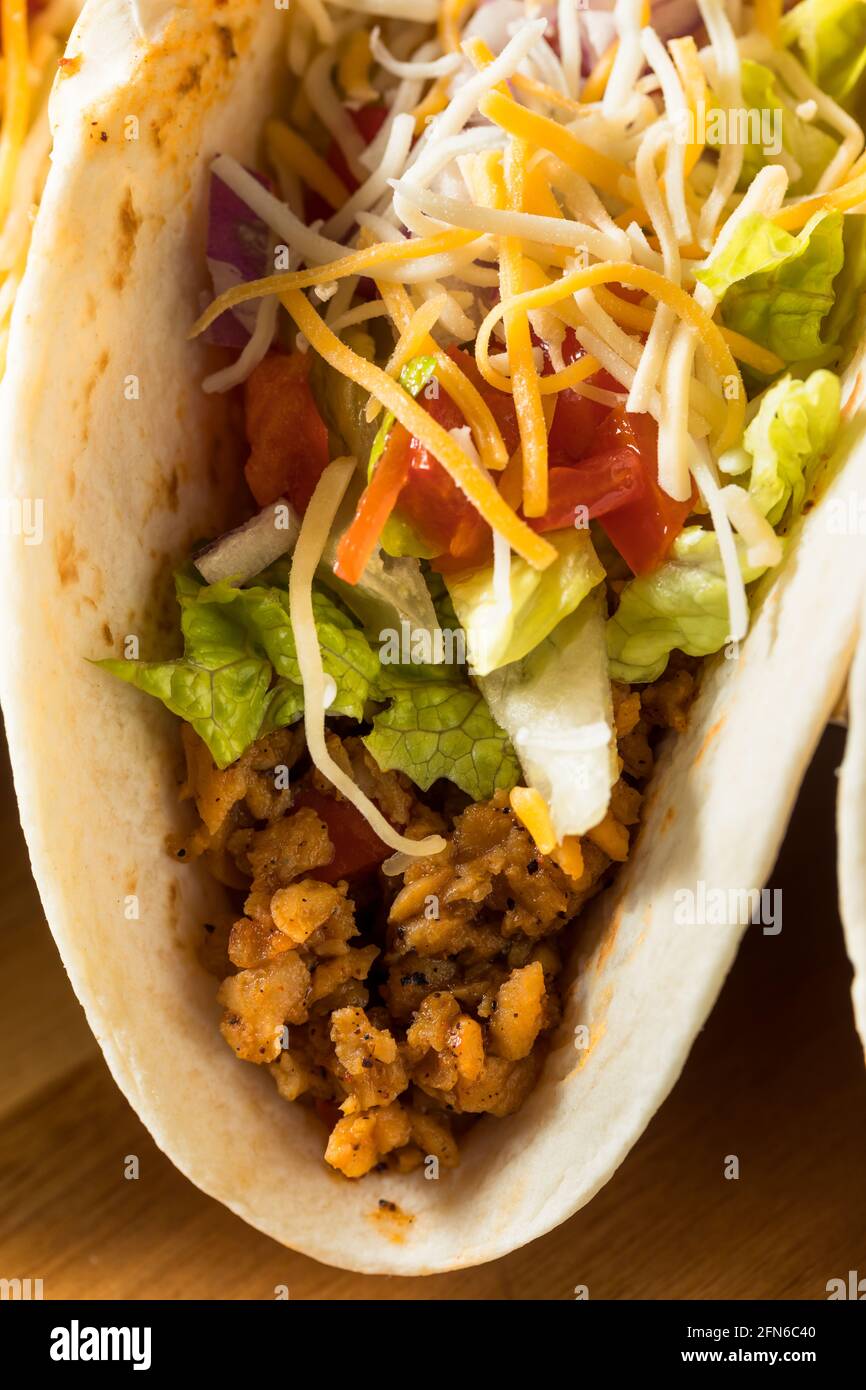 Homemade American Soft Shell Beef Tacos with Lettuce Tomato Cheese Stock Photo