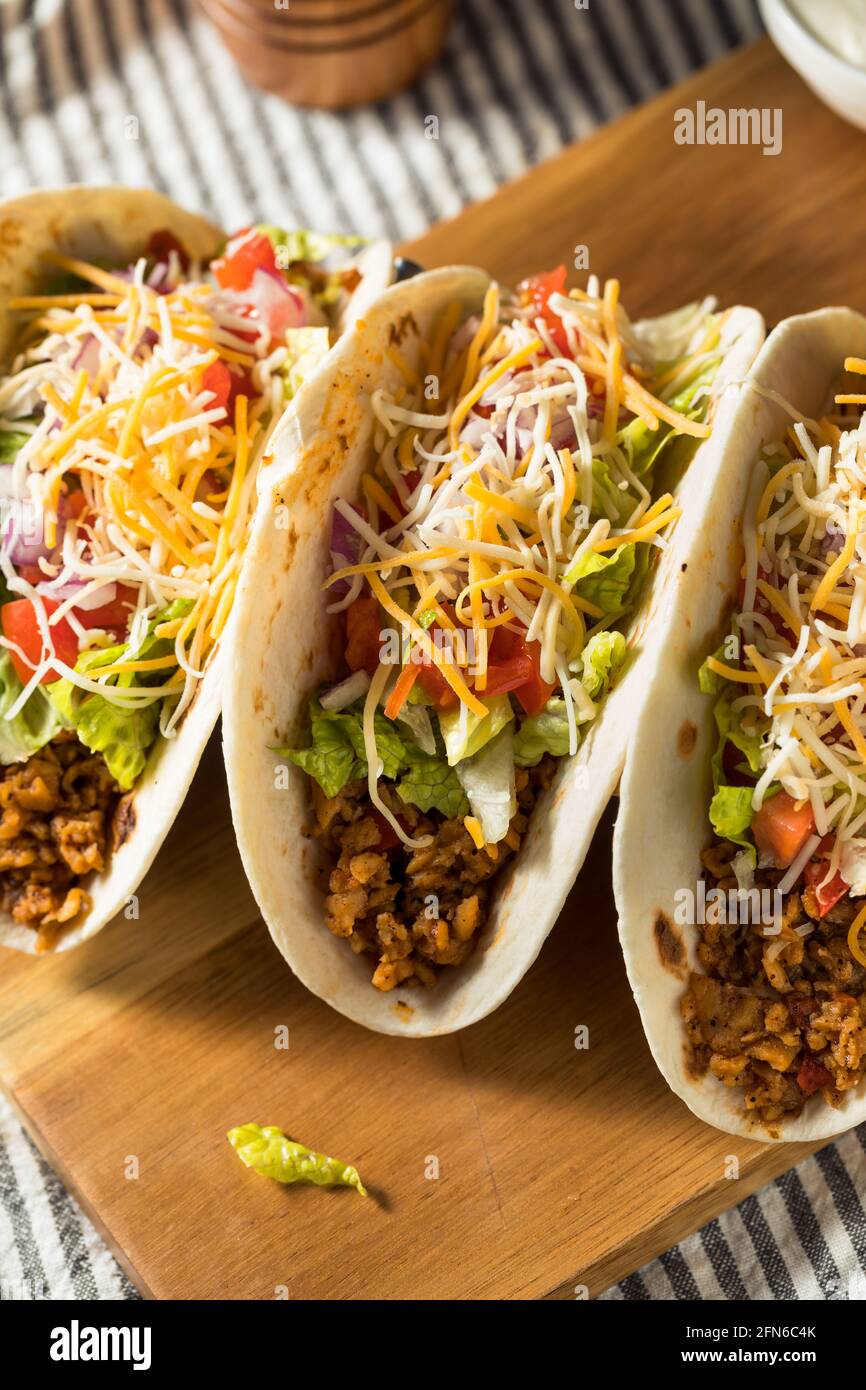 Homemade American Soft Shell Beef Tacos with Lettuce Tomato Cheese Stock Photo