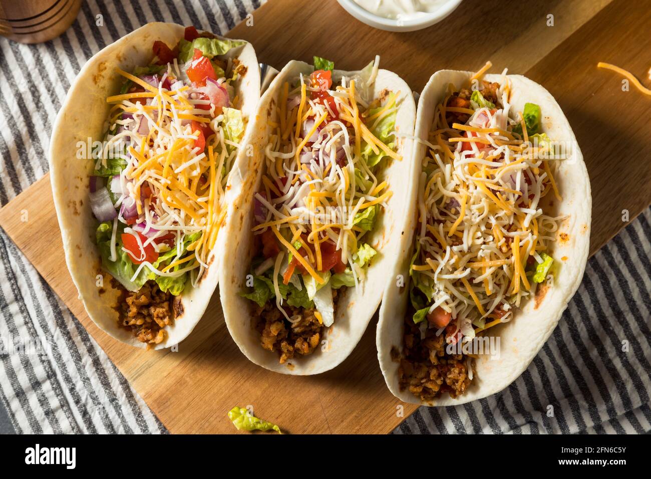 Homemade American Soft Shell Beef Tacos with Lettuce Tomato Cheese Stock Photo