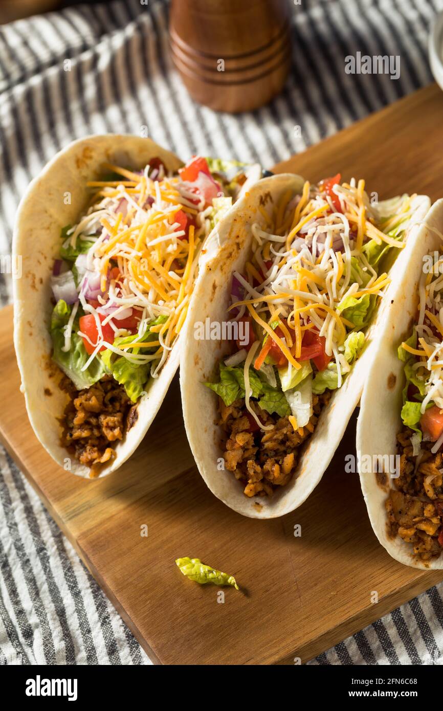 Homemade American Soft Shell Beef Tacos with Lettuce Tomato Cheese Stock Photo