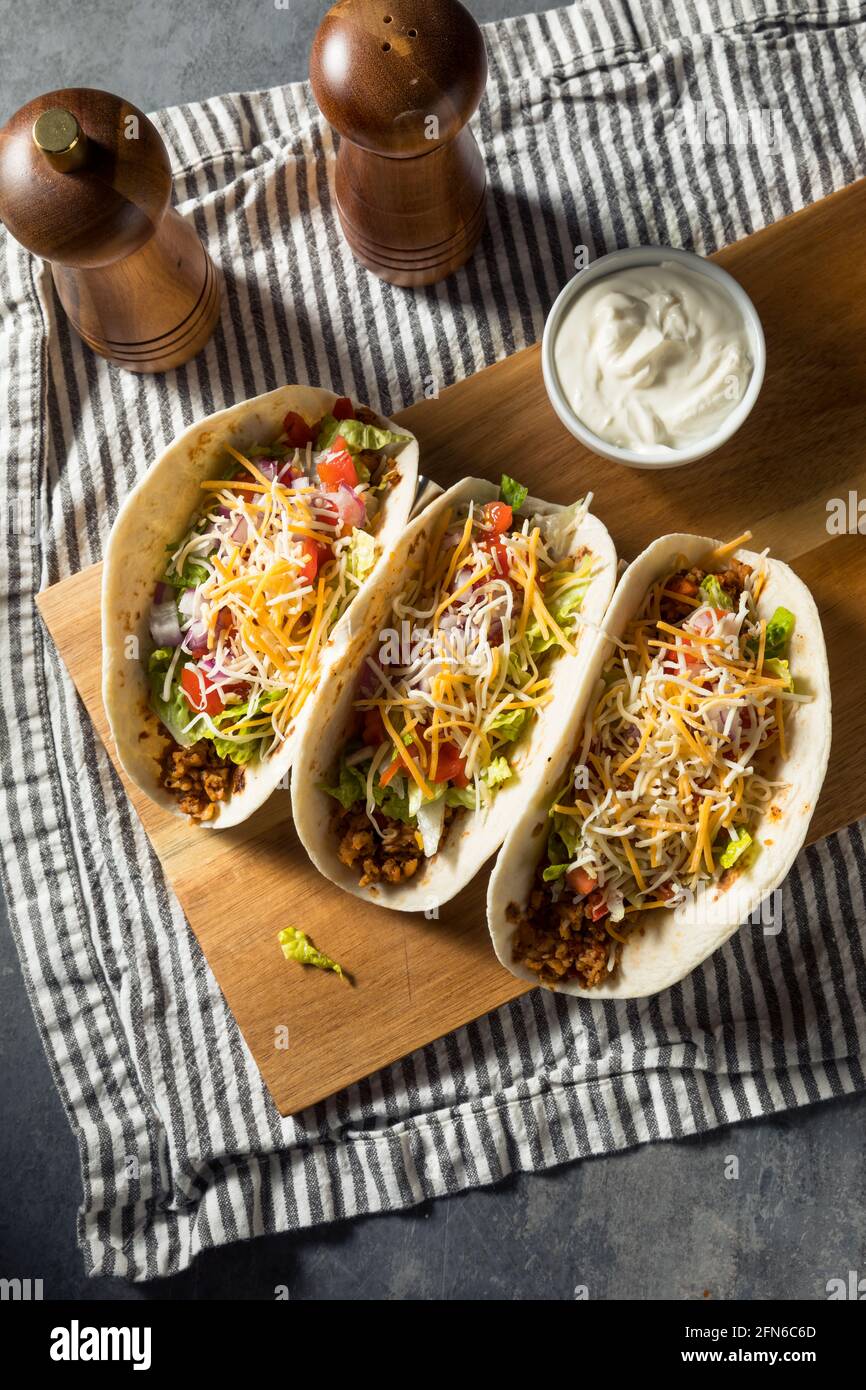 Homemade American Soft Shell Beef Tacos with Lettuce Tomato Cheese Stock Photo