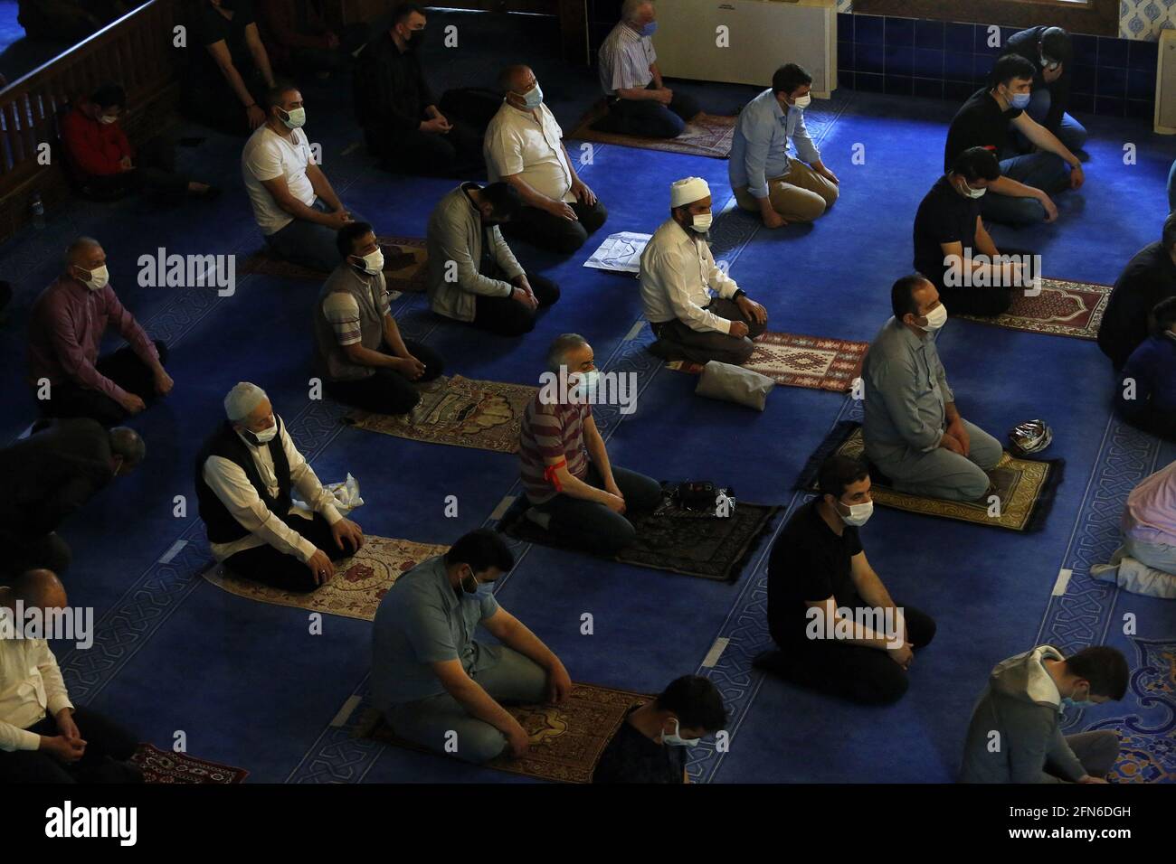 Ankara, Turkey. 14th May, 2021. People perform prayers during the Eid al-Fitr holiday at a mosque in Ankara, Turkey, on May 14, 2021. Credit: Mustafa Kaya/Xinhua/Alamy Live News Stock Photo