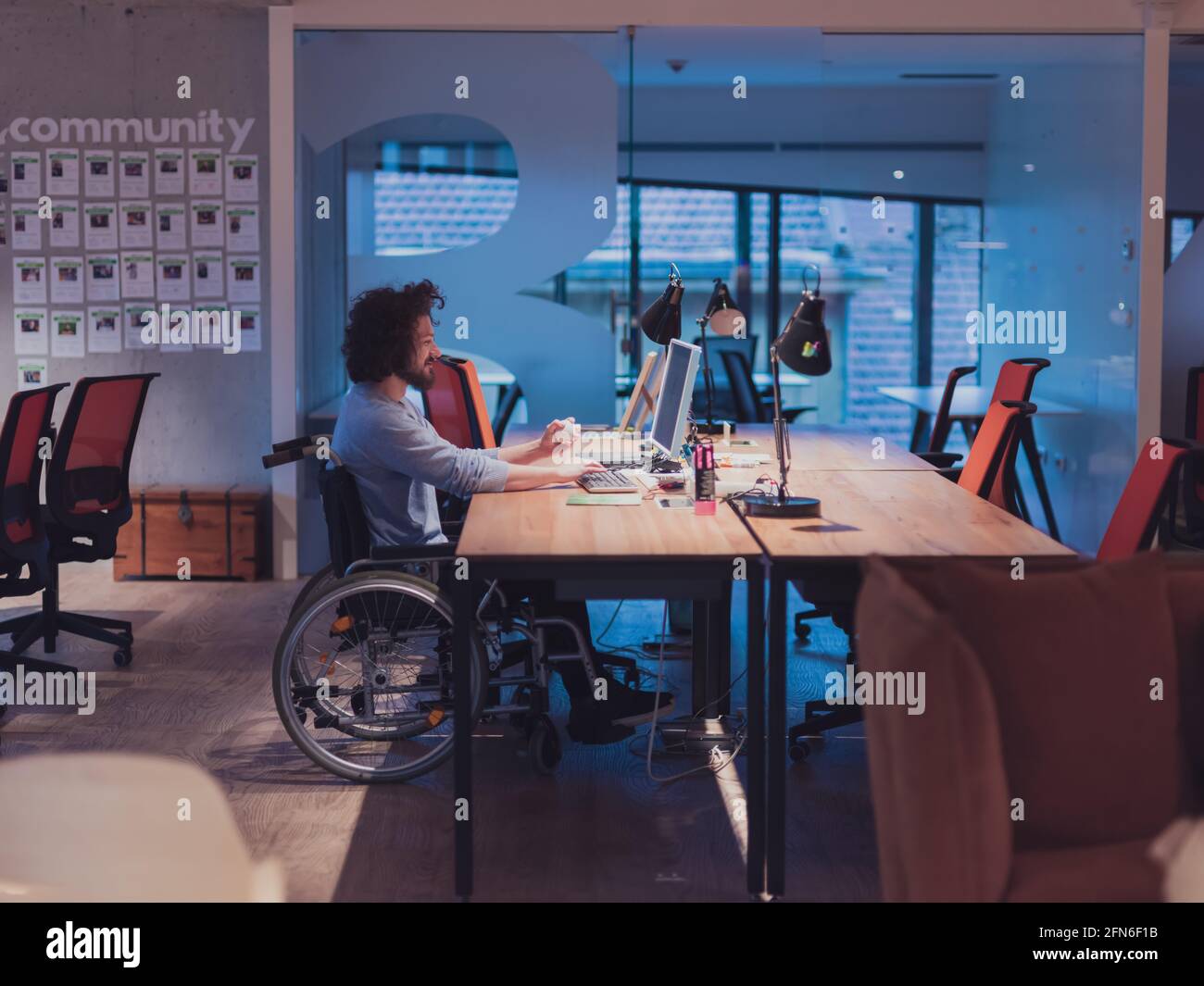 Handicapped professional in his office hi-res stock photography and ...