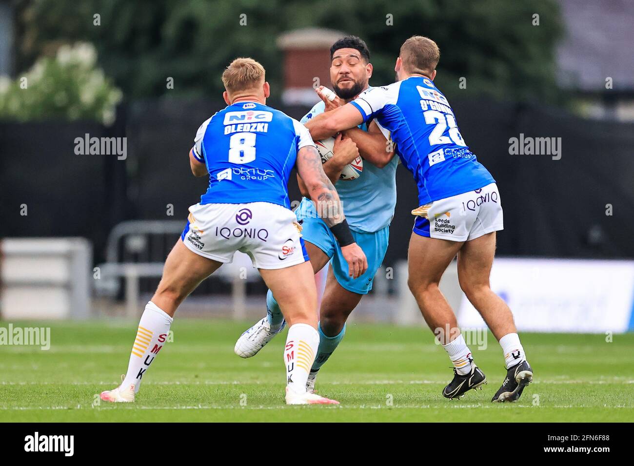Kelepi Tanginoa (12) of Wakefield Trinity is tackled by Jarrod O'Connor (26) of Leeds Rhinos in, on 5/14/2021. (Photo by Mark Cosgrove/News Images/Sipa USA) Credit: Sipa USA/Alamy Live News Stock Photo