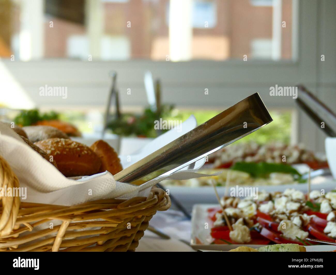 Bread basket tongs hi-res stock photography and images - Alamy