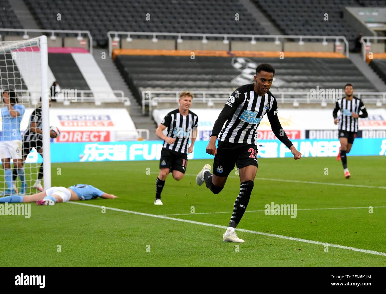 Newcastle United's Joe Willock celebrates scoring their side's third goal of the game during the Premier League match at St James' Park, Newcastle upon Tyne. Picture date: Friday May 14, 2021. Stock Photo
