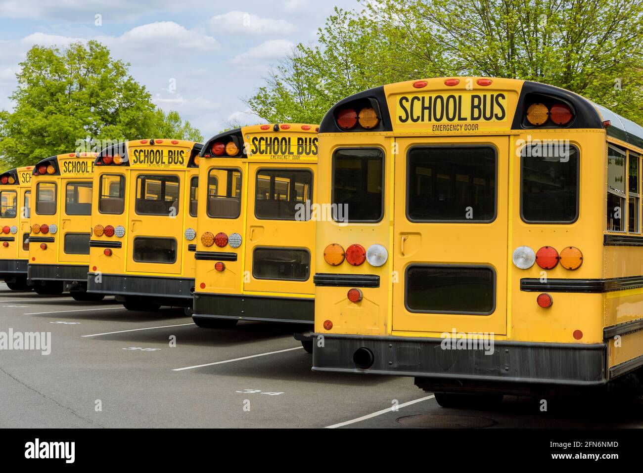Yellow school bus for children educational transport on the street Stock Photo