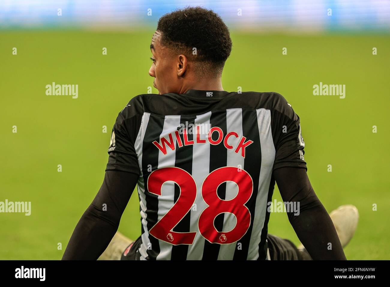 Newcastle, UK. 14th May, 2021. Joe Willock #28 of Newcastle United sits on the pitch after the full-time whistle is blown by referee Kevin Friend in Newcastle, United Kingdom on 5/14/2021. (Photo by Iam Burn/News Images/Sipa USA) Credit: Sipa USA/Alamy Live News Stock Photo