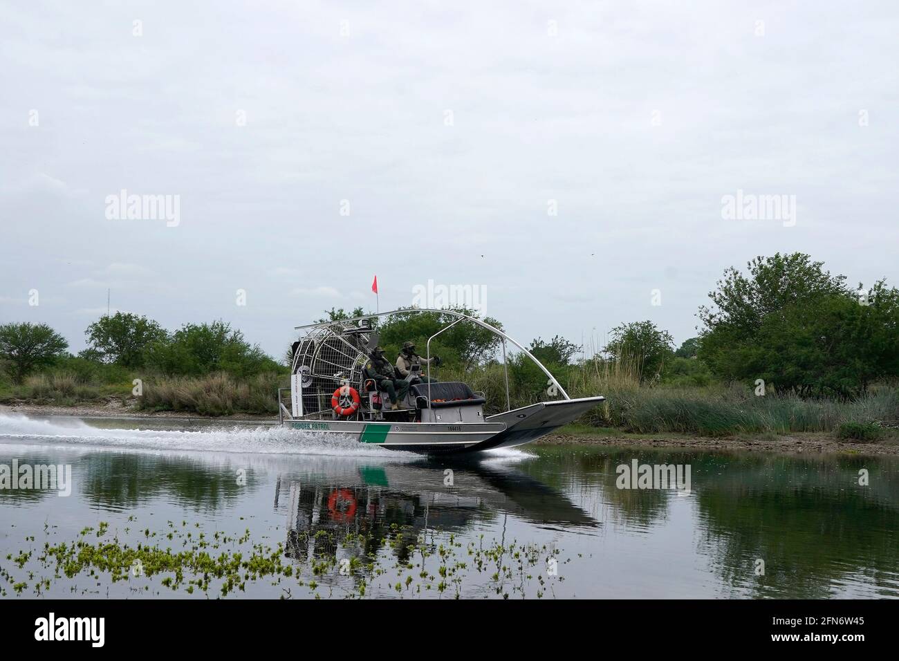 Del Rio, United States. 13th May, 2021. Us Border Patrol air boat patrols the Rio Grande US/Maxican border. According to unofficial estimates approximately 200,000 migrants have crossed into the United States along the southern border since February 2021. (Photo by J Lamparski/SOPA Images/Sipa USA) Credit: Sipa USA/Alamy Live News Stock Photo