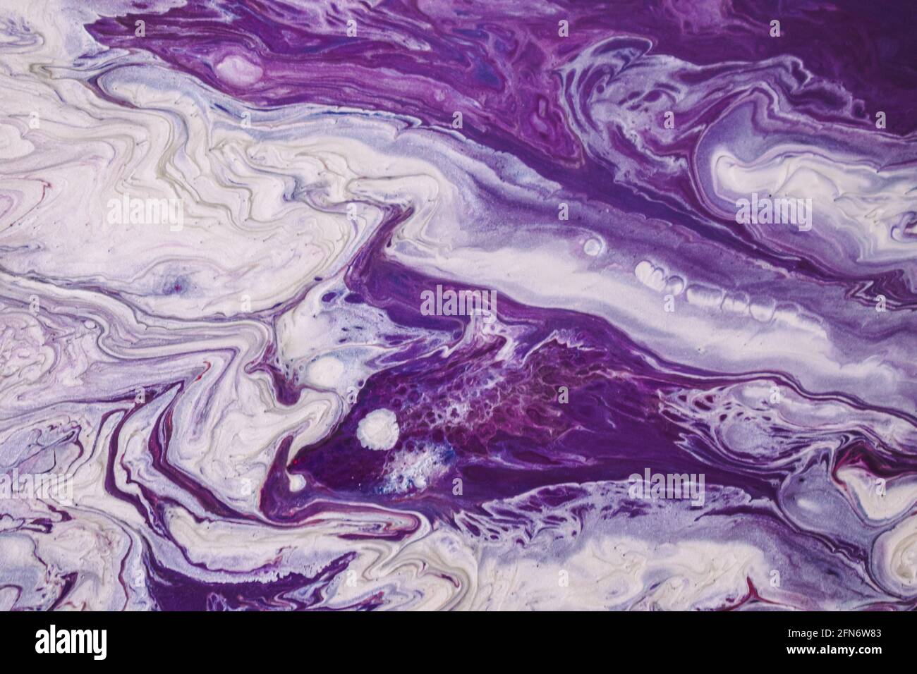 Abstract marble painting with mixed colors in the water perfect for